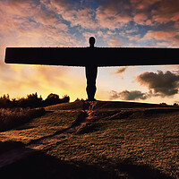Buy canvas prints of The Angel of the North is at the top of a hill, an by Guido Parmiggiani