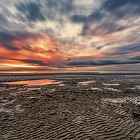 Buy canvas prints of Low tide at sunset by Guido Parmiggiani