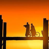Buy canvas prints of U Bein bridge and people at sunset by Guido Parmiggiani