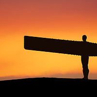 Buy canvas prints of Angel of the North at sunset.  by Guido Parmiggiani