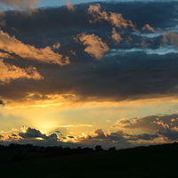 Buy canvas prints of Cloudy Sunset by Marco Buresti