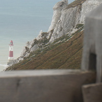 Buy canvas prints of Red Lighthouse, Seven Sisters by Rachael Parker