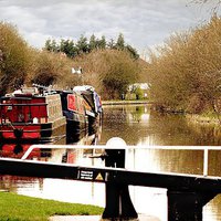 Buy canvas prints of MOORED NARROW BOATS by len milner