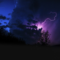 Buy canvas prints of purple lightning between clouds by Eric Fouwels