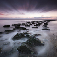 Buy canvas prints of Felixstowe Sea Defences by Julian Mitchell