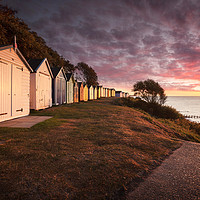 Buy canvas prints of Beach Huts at Sunrise by Julian Mitchell