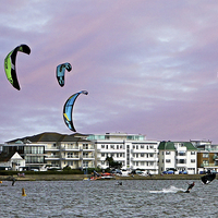 Buy canvas prints of Kite Surfers at Poole Harbour by Jason Williams