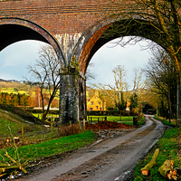 Buy canvas prints of  View through a viaduct. by Jason Williams