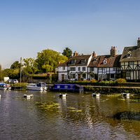 Buy canvas prints of  Tudor homes along River Avon. by Jason Williams