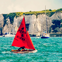 Buy canvas prints of  Little Red Sailboat. by Jason Williams