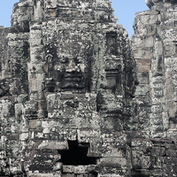 Buy canvas prints of Stone Faces, Bayon Temple, Cambodia by Geoffrey Higges