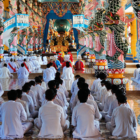 Buy canvas prints of Cao Dai Worship Service, Vietnam by Geoffrey Higges