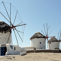 Buy canvas prints of Traditional Windmills, Mykonos, Greek Islands by Geoffrey Higges