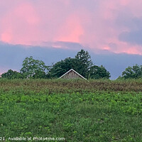 Buy canvas prints of Roof amidst Peak Pink Clouds by Deanne Flouton