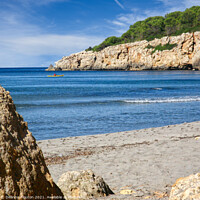 Buy canvas prints of Serenity of the Kayaker Menorca by Deanne Flouton