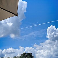 Buy canvas prints of Ethereal Umbrella Sky Flight by Deanne Flouton