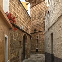 Buy canvas prints of  Backstreet of Ciutadella by Deanne Flouton
