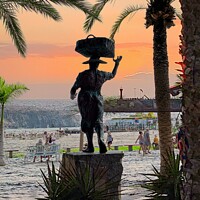 Buy canvas prints of Surreal Statue Scene in Los Cristianos Tenerife by Deanne Flouton