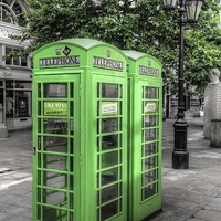 Buy canvas prints of Green telephone boxes by Andy Huntley