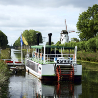 Buy canvas prints of Canal Boatrip from Bruges to Damme by Carolyn Eaton