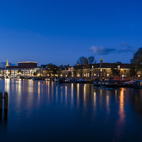 Buy canvas prints of  River Amstel, Amsterdam at Night by Carolyn Eaton