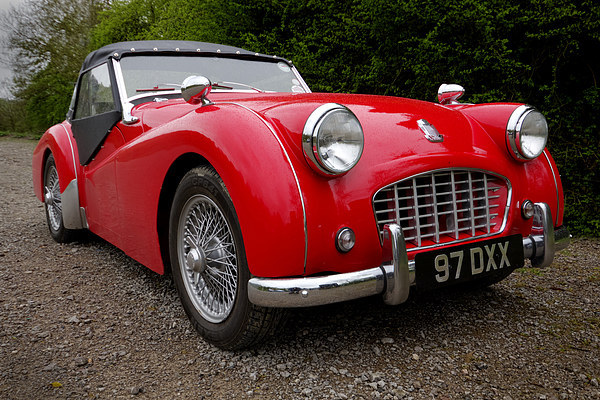 Roaring red TR3 A timeless british classic Picture Board by Alan Tunnicliffe