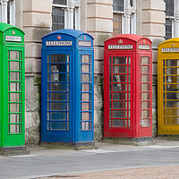 Buy canvas prints of Colourful telephone boxes by Alan Tunnicliffe