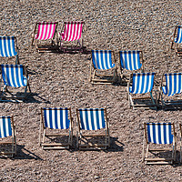 Buy canvas prints of Deck chairs on the beach by Alan Tunnicliffe