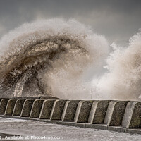 Buy canvas prints of Large waves crashing over sea wall by Alan Tunnicliffe