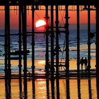 Buy canvas prints of  Pier Sunset by Tim Clifton