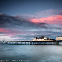 Buy canvas prints of Sunset over Colwyn Bay Pier, North Wales by Christine Smart