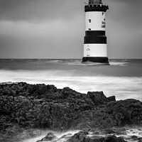 Buy canvas prints of Penmon Lighthouse Anglesey - Monochrome Black and White - Landmark Dark Skies Stormy Seas Welsh Coast Seascape by Christine Smart