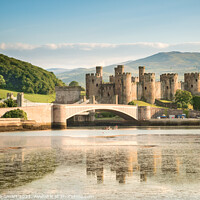 Buy canvas prints of Conwy Castle Sunny Landscape North Wales - Landmark Reflection Blue Sky by Christine Smart