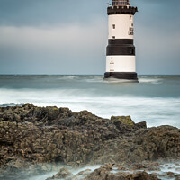 Buy canvas prints of Penmon Lighthouse Anglesey - Landmark Dark Skies Stormy Seas Welsh Coast Seascape by Christine Smart
