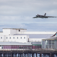 Buy canvas prints of  Vulcan over the pier by Ian Clamp