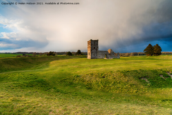 Dramatic skies over the old church at Knowlton  Picture Board by Helen Hotson