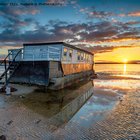 Buy canvas prints of Stunning sunset over an old houseboat moored at Bramble Bush Bay by Helen Hotson