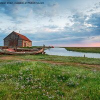 Buy canvas prints of Dramatic sunrise sky over the old coal barn at Thornham by Helen Hotson