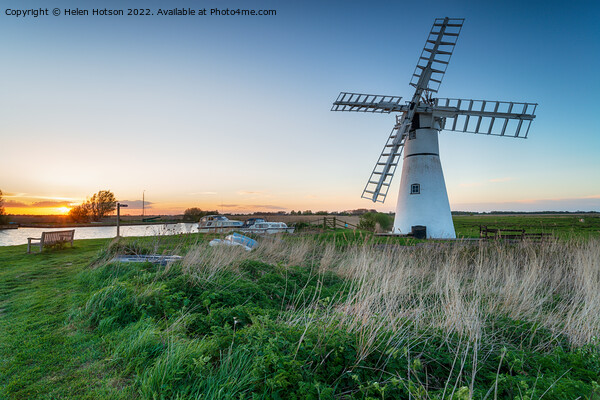 Sunset at Thurne Windmill  Picture Board by Helen Hotson