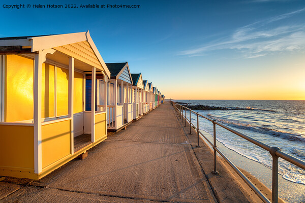 Colorful beach huts on the prom at Southwold Picture Board by Helen Hotson