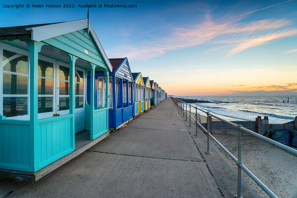 A row of colorful beach huts at Southwold Picture Board by Helen Hotson