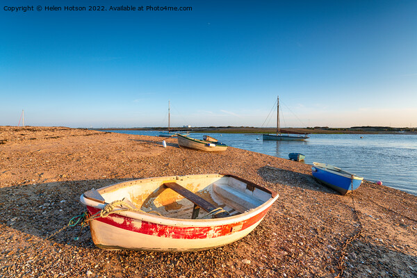 Boats on the beach at West Mersea Picture Board by Helen Hotson