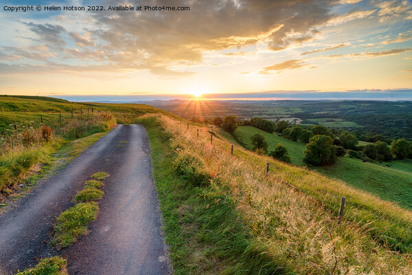 Beautiful sumer sunset in the Dorset countryside Picture Board by Helen Hotson