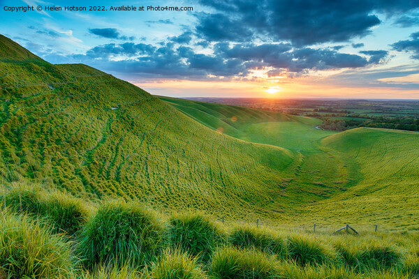Dramatic sunset over The Manger in Uffington Picture Board by Helen Hotson