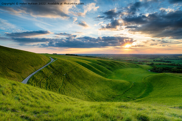 Dramatic sunset sky over The Manger at Uffington Picture Board by Helen Hotson