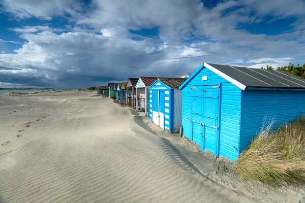 Colourful Beach Huts Picture Board by Helen Hotson