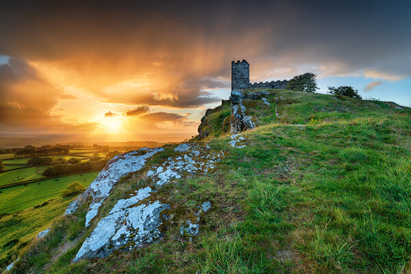 Stormy Sunset over Brentor on Dartmoor Picture Board by Helen Hotson
