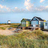 Buy canvas prints of Mudeford Spit Beach Huts by Helen Hotson