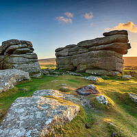 Buy canvas prints of Beautiful sunset over granite rock formations at Combestone Tor  by Helen Hotson
