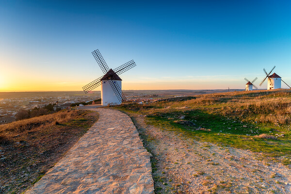 Sunset over Manchegos windmills  Picture Board by Helen Hotson